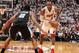 `MIAMI, FL - JUNE 18: LeBron James #6 of the Miami Heat handles the ball while being guarded by Kawhi Leonard #2 of the San Antonio Spurs during Game Six of the 2013 NBA Finals on June 18, 2013 at the American Airlines Arena in Miami, Florida. NOTE TO USE