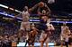 PHOENIX, AZ - FEBRUARY 24: P.J. Tucker #17 of the Phoenix Suns has his shot blocked by Kawhi Leonard #2 of the San Antonio Spurs during the second half of the NBA game at US Airways Center on February 24, 2013 in Phoenix, Arizona. The Spurs defeated the