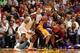 MIAMI, FL - FEBRUARY 10: Kobe Bryant #24 of the Los Angeles Lakers protects the ball from LeBron James #6 of the Miami Heat during a game between the Los Angeles Lakers and the Miami Heat on February 10, 2013 at American Airlines Arena in Miami, Florida.