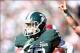 Oct 12, 2013; East Lansing, MI, USA; Michigan State Spartans running back R.J. Shelton (12) runs for a touchdown against Indiana Hoosiers during the second half in a game at Spartan Stadium. MSU won 42-28. Mandatory Credit: Mike Carter-USA TODAY Sports