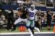 Dec 2, 2012; Arlington, TX, USA; Philadelphia Eagles receiver Riley Cooper (14) makes a third quarter touchdown catch against Dallas Cowboys cornerback Brandon Carr (39) at Cowboys Stadium. Mandatory Credit: Matthew Emmons-USA TODAY Sports