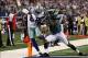 Dec 2, 2012; Arlington, TX, USA; Dallas Cowboys receiver Dez Bryant (88) scores a fourth quarter touchdown against Philadelphia Eagles cornerback Dominique Rodgers-Cromartie at Cowboys Stadium. Mandatory Credit: Matthew Emmons-USA TODAY Sports