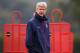 ST ALBANS, ENGLAND - SEPTEMBER 30: Manager Arsene Wenger of Arsenal looks on during an Arsenal training session ahead of their Champions League Group F match against Napoli at London Colney on September 30, 2013 in St Albans, England. (Photo by Paul Gil