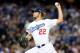 LOS ANGELES, CA - OCTOBER 07: Starting pitcher Clayton Kershaw #22 of the Los Angeles Dodgers pitches in the first inning against the Atlanta Braves in Game Four of the National League Division Series at Dodger Stadium on October 7, 2013 in Los Angeles,