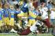PASADENA, CA - SEPTEMBER 21: Quarterback Brett Hundley #17 of the UCLA Bruins jumps over a New Mexico State Aggies defender at the Rose Bowl on September 21, 2013 in Pasadena, California. UCLA won 59-13. (Photo by Stephen Dunn/Getty Images)