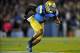 October 12, 2013; Pasadena, CA, USA; UCLA Bruins linebacker Anthony Barr (11) defends against the California Golden Bears during the first half at the Rose Bowl. Mandatory Credit: Gary A. Vasquez-USA TODAY Sports