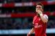 LONDON, ENGLAND - OCTOBER 19: Mesut Oezil of Arsenal celebrates as he scores their second goal during the Barclays Premier League match between Arsenal and Norwich City at Emirates Stadium on October 19, 2013 in London, England. (Photo by Paul Gilham/Ge