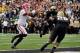 NASHVILLE, TN - OCTOBER 19: Quarterback Aaron Murray #11 of the Georgia Bulldogs scores a touchdown against of the Vanderbilt Commodores at Vanderbilt Stadium on October 19, 2013 in Nashville, Tennessee. (Photo by Frederick Breedon/Getty Images)