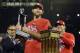 Oct 18, 2013; St. Louis, MO, USA; St. Louis Cardinals starting pitcher Michael Wacha holds the series MVP trophy after game six of the National League Championship Series baseball game against the Los Angeles Dodgers at Busch Stadium. Mandatory Credit: Je
