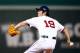 BOSTON, MA - OCTOBER 19: Koji Uehara #19 of the Boston Red Sox throws a pitch against the Detroit Tigers in the ninth inning during Game Six of the American League Championship Series at Fenway Park on October 19, 2013 in Boston, Massachusetts. (Photo b