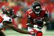 ATLANTA, GA - OCTOBER 20: Harry Douglas #83 of the Atlanta Falcons pulls in this touchdown reception against Johnthan Banks #27 of the Tampa Bay Buccaneers at Georgia Dome on October 20, 2013 in Atlanta, Georgia. (Photo by Kevin C. Cox/Getty Images)