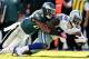 PHILADELPHIA, PA - OCTOBER 20: Dez Bryant #88 of the Dallas Cowboys is tackled by Cary Williams #26 of the Philadelphia Eagles on October 20, 2013 at Lincoln Financial Field in Philadelphia, Pennslyvania.The Dallas Cowboys defeated the Philadelphia Eagle