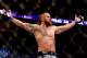 BOSTON, MA - AUGUST 17: Travis Browne celebrates after winning with a knockout against Alistair Overeem in their heavyweight bout at TD Garden on August 17, 2013 in Boston, Massachusetts. (Photo by Jared Wickerham/Getty Images)