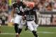 Sep 29, 2013; Cleveland, OH, USA; Cleveland Browns wide receiver Travis Benjamin (80) runs after a catch during the first quarter against the Cincinnati Bengals at FirstEnergy Stadium. Mandatory Credit: Raj Mehta-USA TODAY Sports