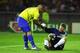 YOKOHAMA - JUNE 30: Oliver Kahn of Germany is helped up by Ronaldo of Brazil during the World Cup Final match played at the International Stadium Yokohama, Yokohama, Japan on June 30, 2002. Brazil won the match 2-0. (Photo by Shaun Botterill/Getty Image