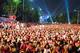 SEOUL, SOUTH KOREA - JULY 2: Thousands of South Korean soccer fans cheer during a festival to celebrate the success of the South Korean team taking fourth place in the 2002 World Cup Korea/Japan July 2, 2002 in downtown Seoul. (Photo by Chung Sung-Jun/G