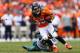 DENVER, CO - SEPTEMBER 29: Wes Welker #83 of the Denver Broncos runs for a first down past DeMeco Ryans #59 of the Philadelphia Eagles after making a reception during the third quarter at Sports Authority Field Field at Mile High on September 29, 2013 in
