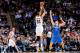 SAN ANTONIO, TX - APRIL 3: Tim Duncan #21 of the San Antonio Spurs shoots against Nikola Vucevic #9 of the Orlando Magic on April 3, 2013 at the AT&T Center in San Antonio, Texas. NOTE TO USER: User expressly acknowledges and agrees that, by downloading a