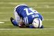 Oct 20, 2013; Indianapolis, IN, USA; Indianapolis Colts wide receiver Reggie Wayne (87) reacts after sustaining an injury against the Denver Broncos in the 2nd half during the game at Lucas Oil Stadium. Mandatory Credit: Brian Spurlock-USA TODAY Sports