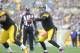 PITTSBURGH, PA - OCTOBER 20: Ben Roethlisberger #7 of the Pittsburgh Steelers fires a pass against the Baltimore Ravens during the first quarter at Heinz Field on October 20, 2013 in Pittsburgh, Pennsylvania. (Photo by Vincent Pugliese/Getty Images)