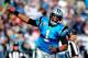 CHARLOTTE, NC - OCTOBER 20: Cam Newton #1 of the Carolina Panthers reacts after teammate Steve Smith's 800th career touchdown during play against of the St. Louis Rams at Bank of America Stadium on October 20, 2013 in Charlotte, North Carolina. The Panth