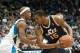 Apr 15, 2013; Minneapolis, MN, USA; Utah Jazz power forward Derrick Favors (15) looks to drive against Minnesota Timberwolves power forward Dante Cunningham (33) in the fourth quarter at Target Center. The Jazz won 96-80. Mandatory Credit: Greg Smith-USA