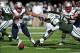 Oct 20, 2013; East Rutherford, NJ, USA; New England Patriots outside linebacker Dont'a Hightower (54) and New York Jets quarterback Geno Smith (7) go after a fumble during the first half at MetLife Stadium. Mandatory Credit: Joe Camporeale-USA TODAY Sport