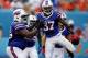 Oct 20, 2013; Miami Gardens, FL, USA; Buffalo Bills defensive back Nickell Robey (37) celebrates with defensive tackle Marcell Dareus (99) after his interception for a touchdown against the Miami Dolphins in the first quarter at Sun Life Stadium. Mandato
