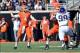 Oct 19, 2013; Stillwater, OK, USA; Oklahoma State Cowboys quarterback J.W. Walsh (4) drops back to pass against the Texas Christian Horned Frogs during the first half at Boone Pickens Stadium. Oklahoma State won 24-10. Mandatory Credit: Peter G. Aiken-USA