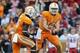 Oct 19, 2013; Knoxville, TN, USA; Tennessee Volunteers quarterback Justin Worley (14) hands the ball off to running back Marlin Lane (15) during the second quarter against the South Carolina Gamecocks at Neyland Stadium. Mandatory Credit: Randy Sartin-USA