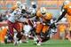 Oct 19, 2013; Knoxville, TN, USA; Tennessee Volunteers running back Marlin Lane (15) is tackled by South Carolina Gamecocks linebacker Marcquis Roberts (21) during the second quarter at Neyland Stadium. Mandatory Credit: Randy Sartin-USA TODAY Sports