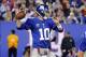 Oct 21, 2013; East Rutherford, NJ, USA; New York Giants quarterback Eli Manning (10) throws pass during the first half against the Minnesota Vikings at MetLife Stadium. Mandatory Credit: Jim O'Connor-USA TODAY Sports