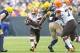 Browns running back Fozzy Whittaker (center)