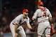 Oct 23, 2013; Boston, MA, USA; St. Louis Cardinals catcher Yadier Molina (4) gives the ball to starting pitcher Adam Wainwright (50) after they failed to catch a popup against the Boston Red Sox during the second inning during game one of the MLB baseball