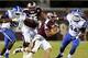 Oct 24, 2013; Starkville, MS, USA; Mississippi State Bulldogs quarterback Dak Prescott (15) advances the ball during the game against the Kentucky Wildcats at Davis Wade Stadium. Mississippi State Bulldogs win the game against Kentucky Wildcats 28-22. Ma