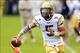 Oct 19, 2013; Atlanta, GA, USA; Georgia Tech Yellow Jackets quarterback Justin Thomas (5) runs the ball in the second half against Syracuse at Bobby Dodd Stadium. Georgia Tech won 56-0. Mandatory Credit: Daniel Shirey-USA TODAY Sports