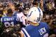 Oct 20, 2013; Indianapolis, IN, USA; Denver Broncos quarterback Peyton Manning (18) shakes hands with Indianapolis Colts quarterback Andrew Luck (12) after the game at Lucas Oil Stadium. Mandatory Credit: Brian Spurlock-USA TODAY Sports