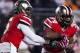 Oct 26, 2013; Columbus, OH, USA; Ohio State Buckeyes quarterback Braxton Miller (5) hands the ball off to running back Carlos Hyde (34) against the Penn State Nittany Lions at Ohio Stadium. Ohio State won 63-14. Mandatory Credit: Greg Bartram-USA TODAY Sp