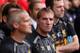 Morgan (R) on the Liverpool bench alongside Brendan Rodgers