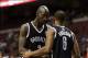 Kevin Garnett instructing Alan Anderson.