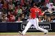 Sep 13, 2013; Atlanta, GA, USA; Atlanta Braves catcher Brian McCann (16) hits a home run against the San Diego Padres during the fourth inning at Turner Field. Mandatory Credit: Dale Zanine-USA TODAY Sports
