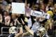 High fives all around for New Orleans Saints quarterback Drew Brees' five-touchdown game.