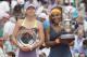 Jun 8, 2013; Paris, France; Serena Williams (USA), right, and Maria Sharapova (RUS) pose with their trophies after their match on day 14 of the 2013 French Open at Roland Garros. Mandatory Credit: Susan Mullane-USA TODAY Sports