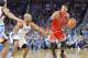 Oct 23, 2013; Wichita, KS, USA; Chicago Bulls guard Derrick Rose (1) drives against Oklahoma City Thunder guard Derek Fisher (6) during the first half at Intrust Bank Arena. Mandatory Credit: Peter G. Aiken-USA TODAY Sports