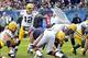 Dec 16, 2012; Chicago, IL, USA; Green Bay Packers quarterback Aaron Rodgers (12) calls a play against the Chicago Bears during the second half at Soldier Field. The Packers beat the Bears 21-13. Mandatory Credit: Rob Grabowski-USA TODAY Sports