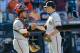 Sep 19, 2013; New York, NY, USA; San Francisco Giants relief pitcher Javier Lopez (49) and catcher Hector Sanchez (29) celebrate the win against the New York Mets at Citi Field. Giants won 2-1. Mandatory Credit: Anthony Gruppuso-USA TODAY Sports