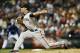 Aug 27, 2013; Denver, CO, USA; San Francisco Giants pitcher Javier Lopez (49) delivers a pitch during the eighth inning against the Colorado Rockies at Coors Field. The Giants won 5-3. Mandatory Credit: Chris Humphreys-USA TODAY Sports