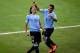 BELO HORIZONTE, BRAZIL - JUNE 26: Edinson Cavani of Uruguay celebrates scoring his team's first goal to make the score 1-1 with team-mate Luis Suarez (R) during the FIFA Confederations Cup Brazil 2013 Semi Final match between Brazil and Uruguay at Govern