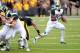 Oct 5, 2013; Iowa City, IA, USA; Michigan State Spartans running back Jeremy Langford (33) runs the football against the Iowa Hawkeyes at Kinnick Stadium. Mandatory Credit: Reese Strickland-USA TODAY Sports