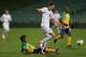 AUCKLAND, NEW ZEALAND - SEPTEMBER 11: Chris Killen of New Zealand takes the ball over the top of Freddie Kini of the Solomon Islands during the FIFA World Cup Qualifier match between the New Zealand All Whites and Solomon Islands at Eden Park on Septembe
